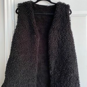 Fuzzy reversable black vest